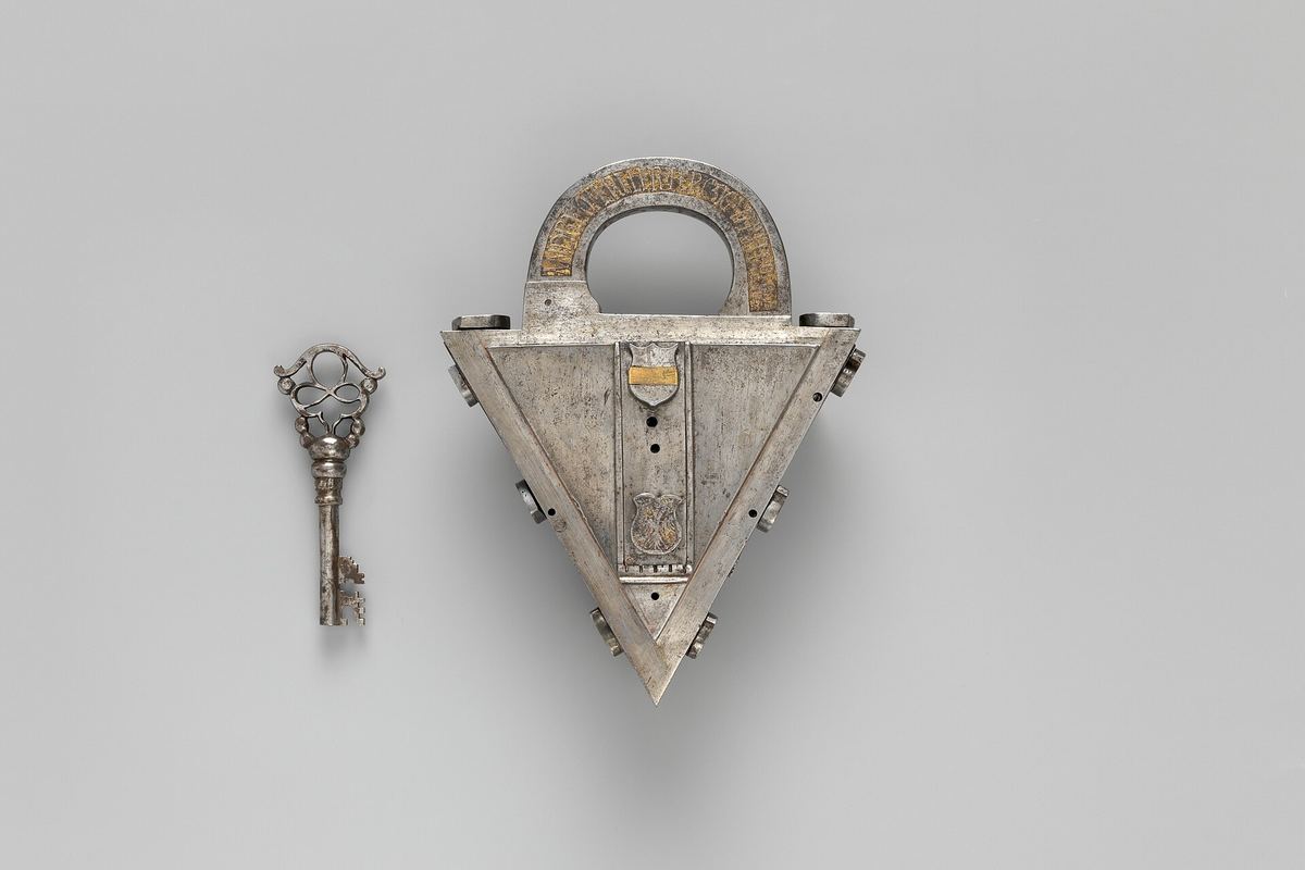 A metal padlock with key, a symbol for encryption and access protection